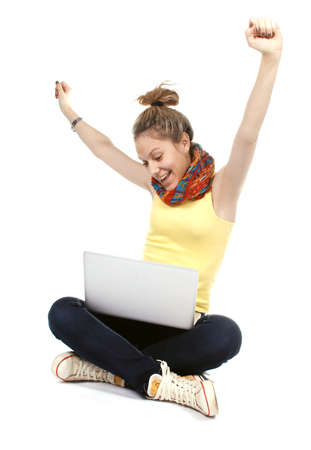 girl with laptop - isolated over a white backgroundの写真素材