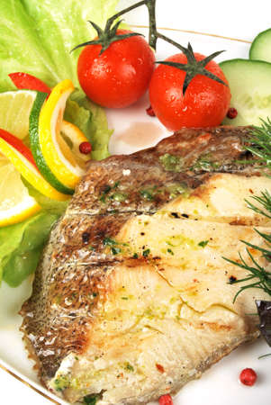 Grilled Foods - Grilled Fish with Lemon and Cherry Tomatoの写真素材