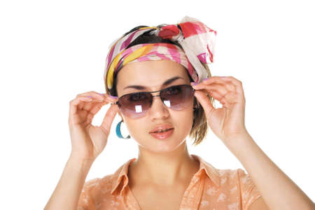 Pretty young girl in glasses against isolated white backgroundの写真素材