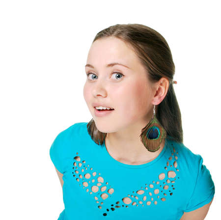 Closeup portrait of a happy young woman smiling isolated on white backgroundの写真素材