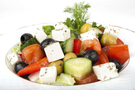 Feta salad with tomatoes and green olivesの写真素材