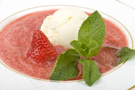 Ice-cream in a strawberry syrupの写真素材