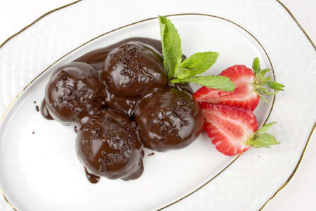 ice cream covered in chocolateの写真素材