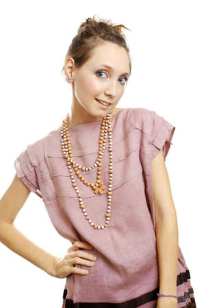 young girl in an ethnic dress with a beadsの写真素材