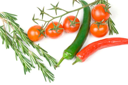 fresh vegetables in plate isolated on white backgroundの写真素材