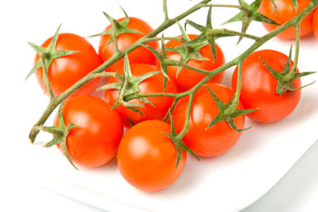 fresh tomatoes on whiteの写真素材