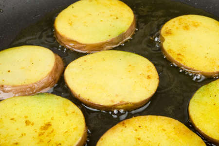Sliced Potatoes in Panの写真素材