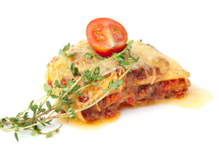 fresh baked lasagna on platesの写真素材