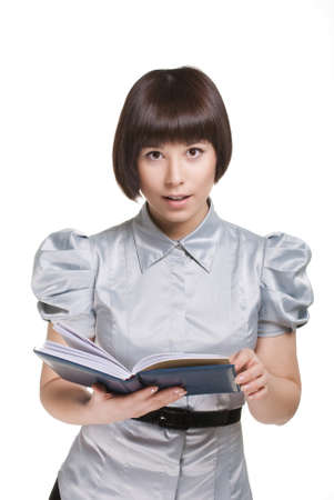 business woman with the book in handsの写真素材