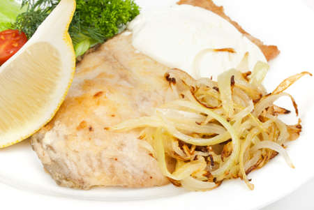Carp stewed with sour cream and fried onionsの写真素材