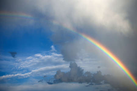 clouds with rainbowの写真素材