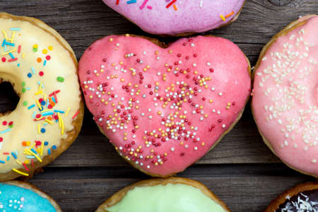 Donuts on a wooden tableの写真素材