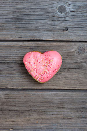 Donuts on a wooden backgroundの写真素材