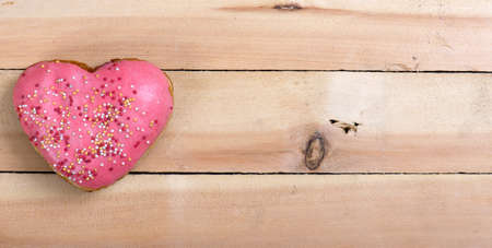 Donuts on a wooden tableの写真素材