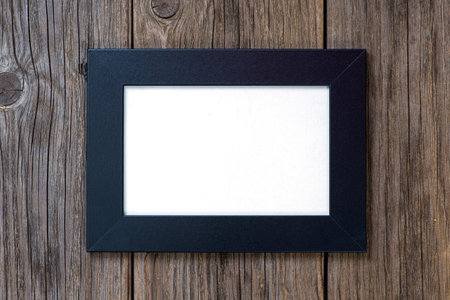 black frame on wood background