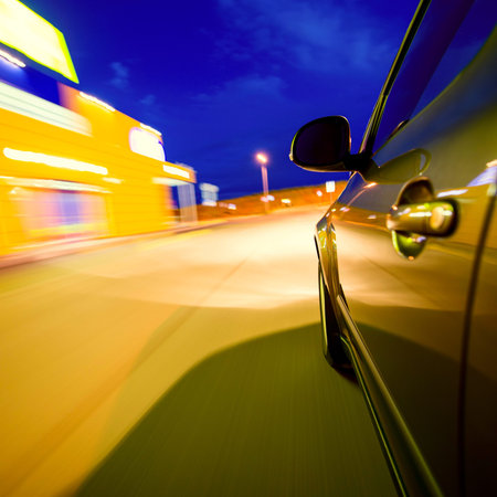 Car in motion at night