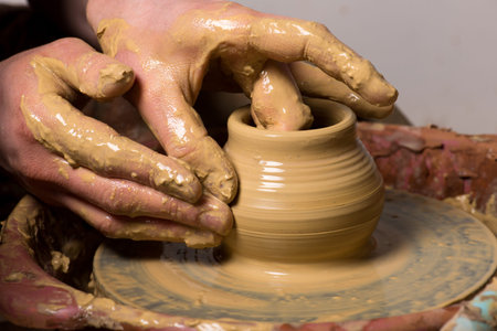potter, creating an earthen jar