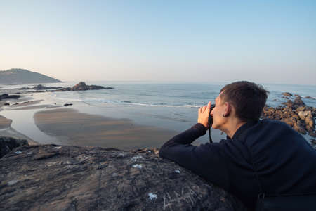 man take a photoの写真素材