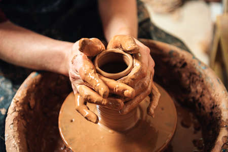 Potter at work. Workshop placeの写真素材