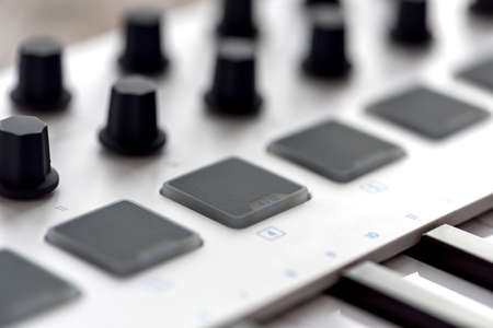 MIDI keyboard with pads and faders.の写真素材