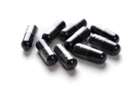 Pharmacy theme. Multicolored Isolated Pills and Capsules.の写真素材