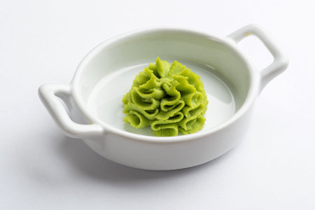 Portion of wasabi in a white gravy boat
