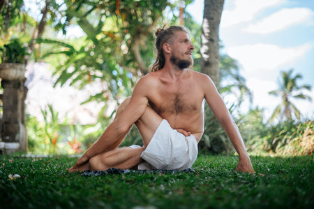 Man practice Yoga practice and meditation outdoor.