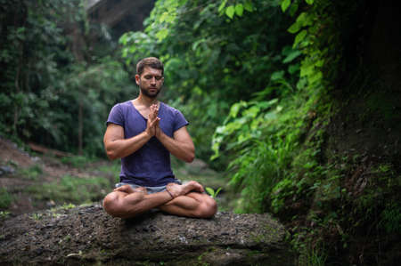 Man practice Yoga practice and meditation outdoor.の写真素材