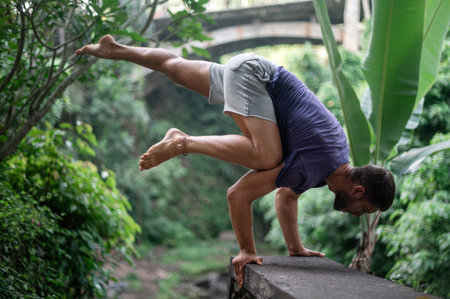 Man practice Yoga practice and meditation outdoor.