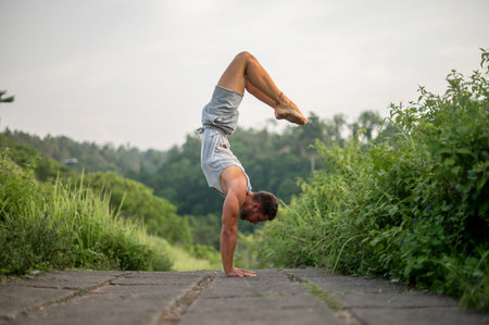 Man practice Yoga practice and meditation outdoor.