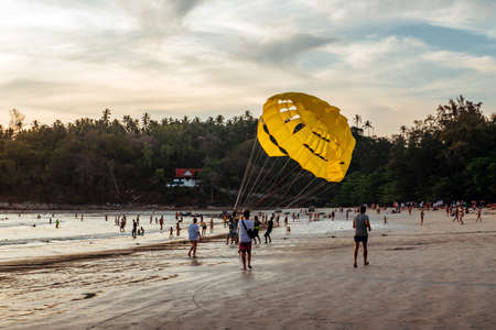 Parachute fun at Kata Beach in Phuket, Thailand. April 28, 2019.のeditorial素材