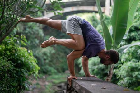 Man practice Yoga practice and meditation outdoorの写真素材