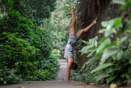 Man practice Yoga practice and meditation outdoorの写真素材