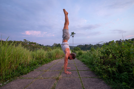 Man practice Yoga practice and meditation outdoor