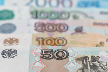 Russian rubles background. Money background and texture. Banknotes of different denominationsの写真素材