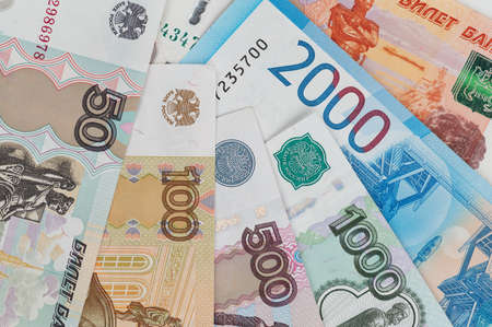 Russian rubles background. Money background and texture. Banknotes of different denominationsの写真素材