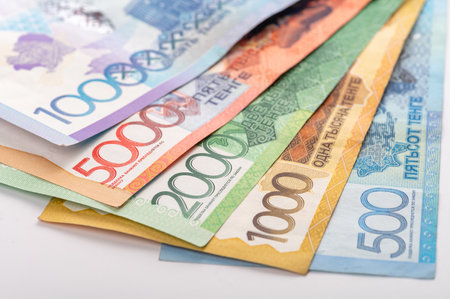 Kazakhstan money - tenge. 500, 1000, 2000, 5000, 10000 banknotes. Close up of tenge on white background.の写真素材