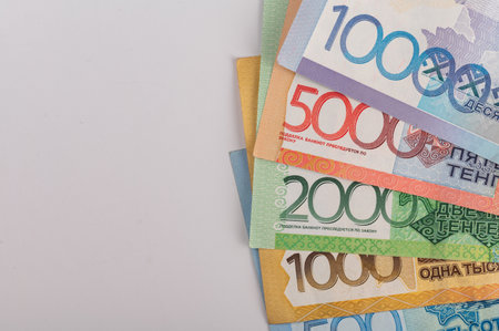 Kazakhstan money - tenge. 500, 1000, 2000, 5000, 10000 banknotes. Close up of tenge on white background.の写真素材
