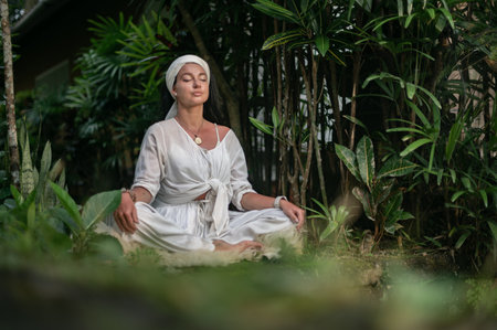 Girl practice yoga meditation outdoor in parkの写真素材