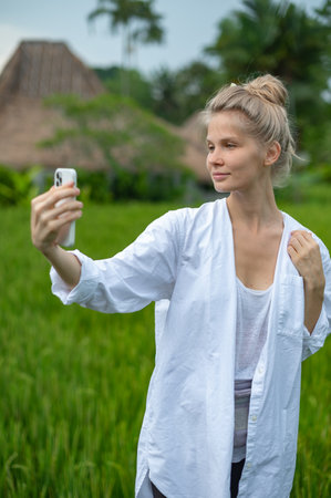 Blogger girl walking and meditate outdoor in parkの写真素材