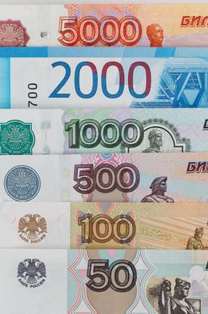 Russian rubles background. Money background and texture. Banknotes of different denominationsの写真素材