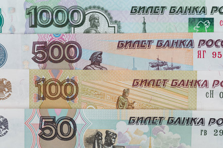 Russian rubles background. Money background and texture. Banknotes of different denominationsの写真素材