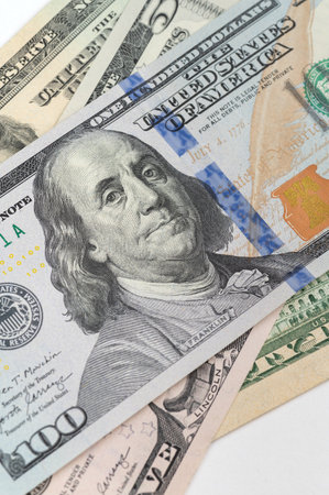 Close up 100 Dollar bank note. Franklin face macro. One hundred American dollars.の写真素材