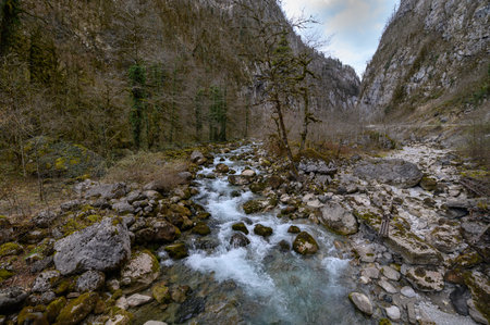 Mountain road with steep cliffs. Beautiful road landscapeの写真素材