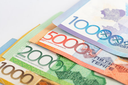 Kazakhstan money - tenge. 500, 1000, 2000, 5000, 10000 banknotes. Close up of tenge on white background.の写真素材