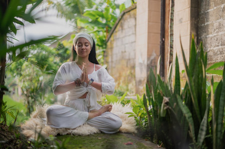 Girl practice yoga meditation outdoor in parkの写真素材
