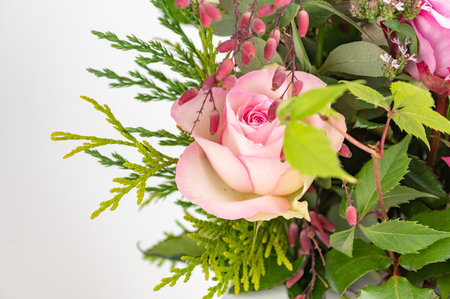 Rose flower bouquet on white background close upの写真素材