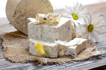 Handmade Soap with bath and spa accessories. White soap composition with flowersの写真素材