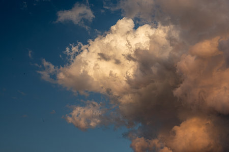 Beautiful clouds in sunset with blue skyの写真素材