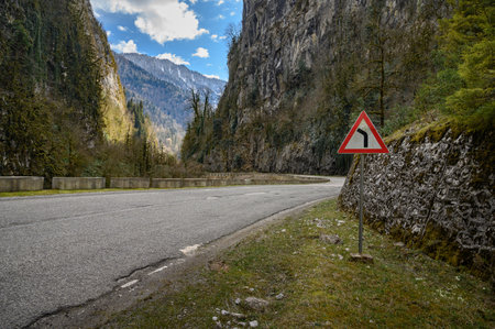 Mountain road with steep cliffs. Beautiful road landscapeの写真素材